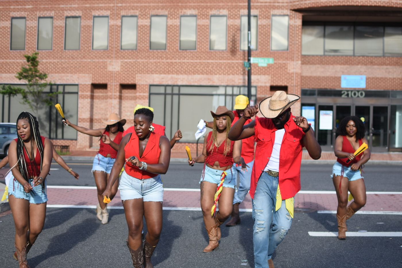 DMV City Slickerz line dancing in the streets of Washington, DC