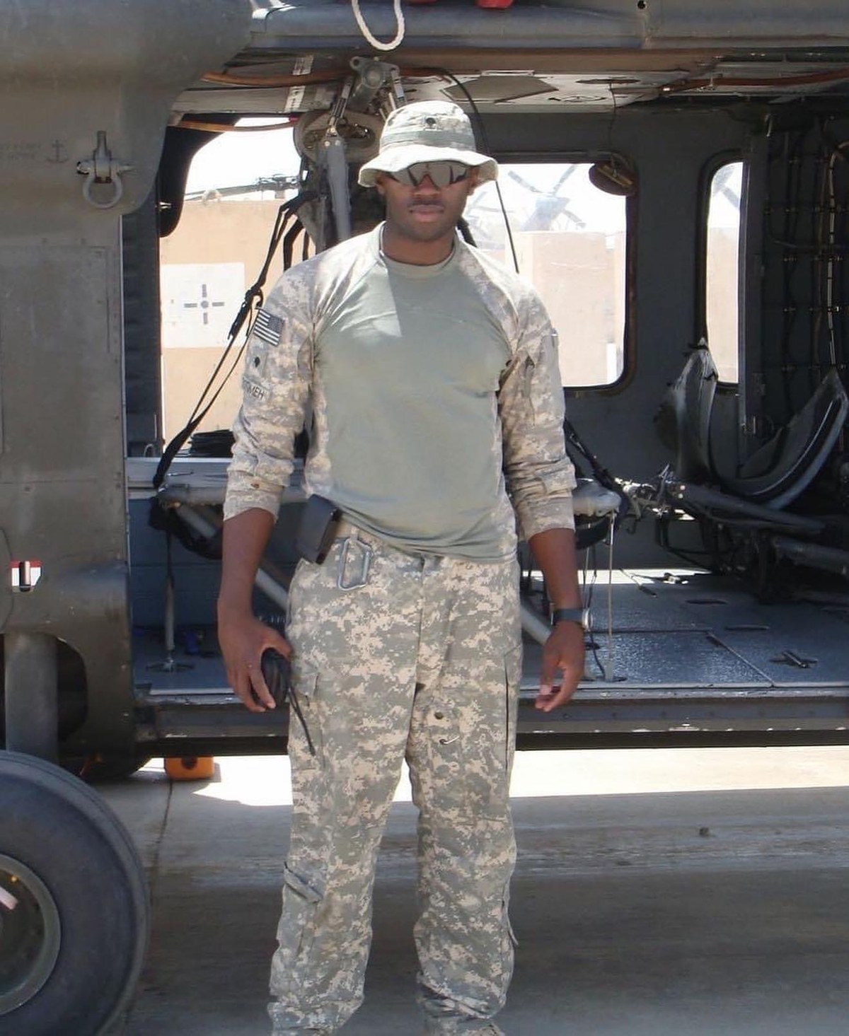 Lawrence at the open door of a Black Hawk